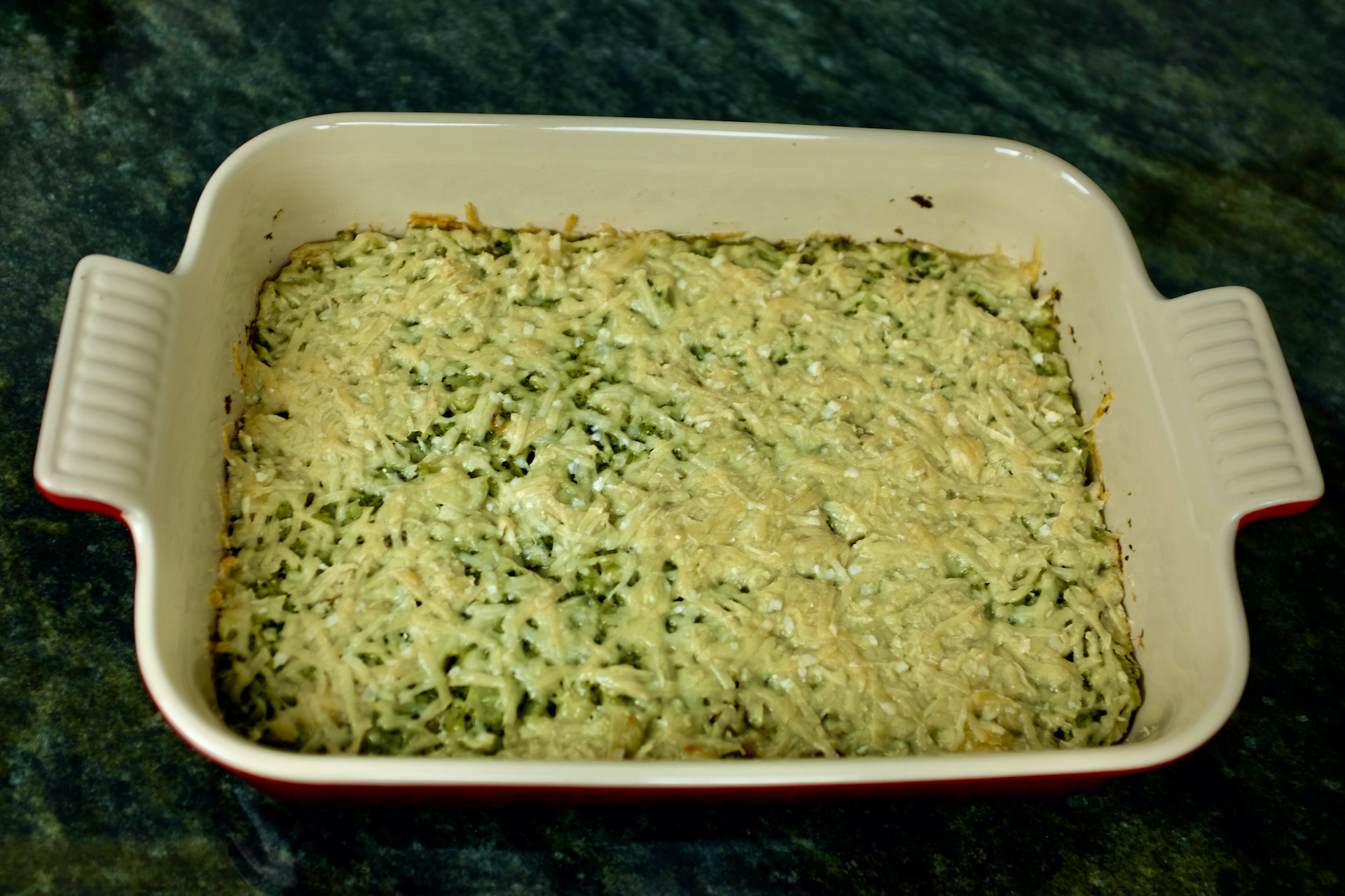 oven baked garlic broccoli au gratin with parmesan cheese