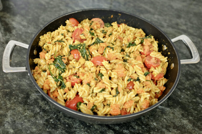 pasta salad with sun dried tomato pesto and small fresh tomatoes