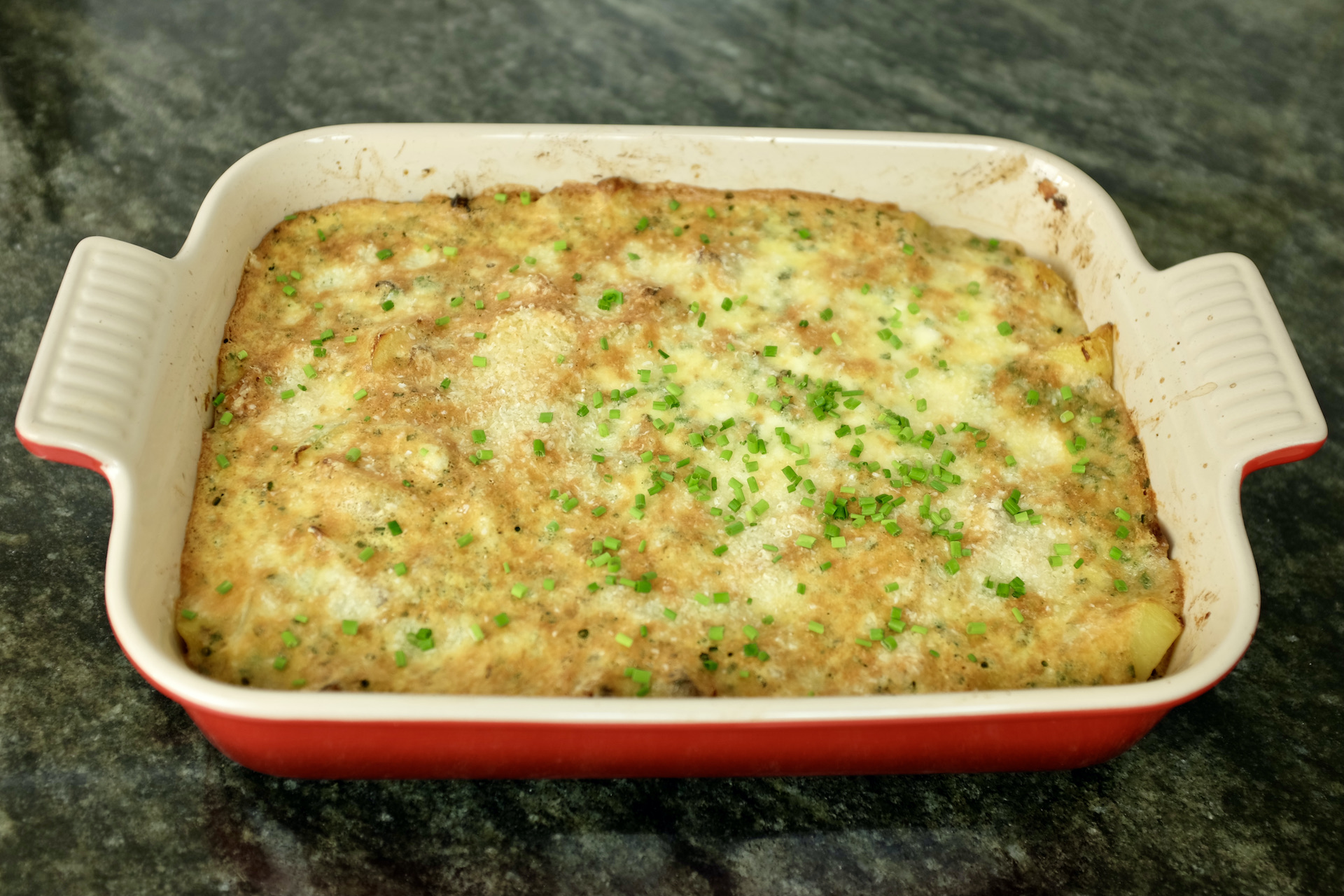 oven baked potatoes and mixed mushrooms with cottage cheese chives parmesan cheese and truffle oil