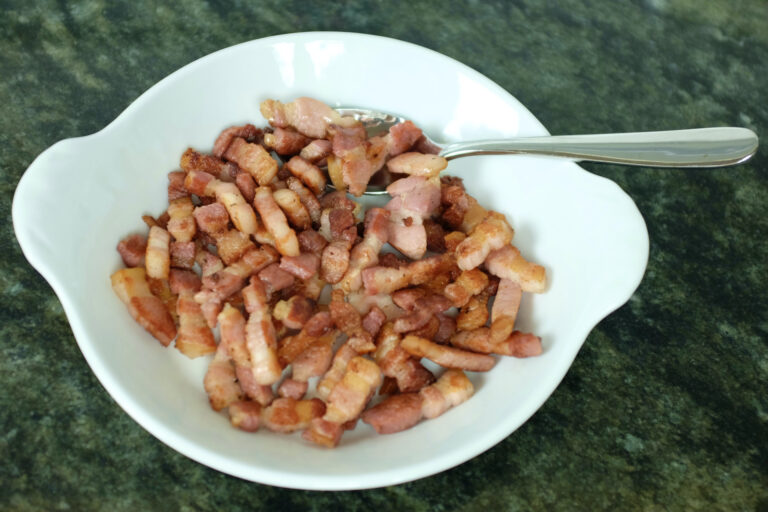 fried salted bacon in strips