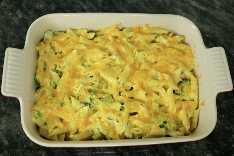 baked broccoli and penne pasta gratinated with cheddar cheese