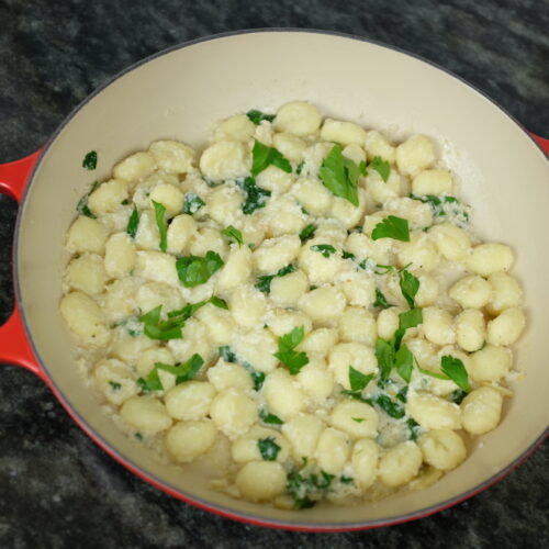 gnocchi and crab with garlic parsley and a squeeze of lemon juice