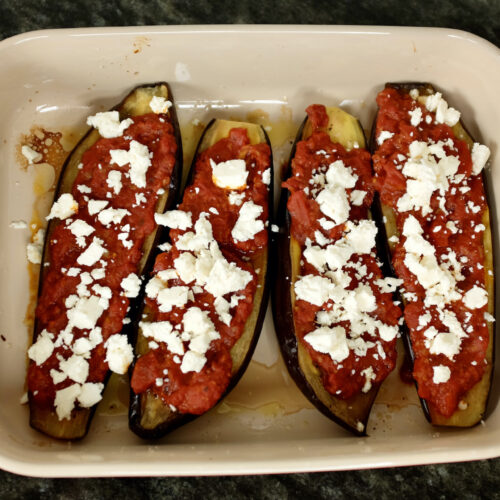 aubergines baked greek style with tomatoes garlic oregano and feta cheese