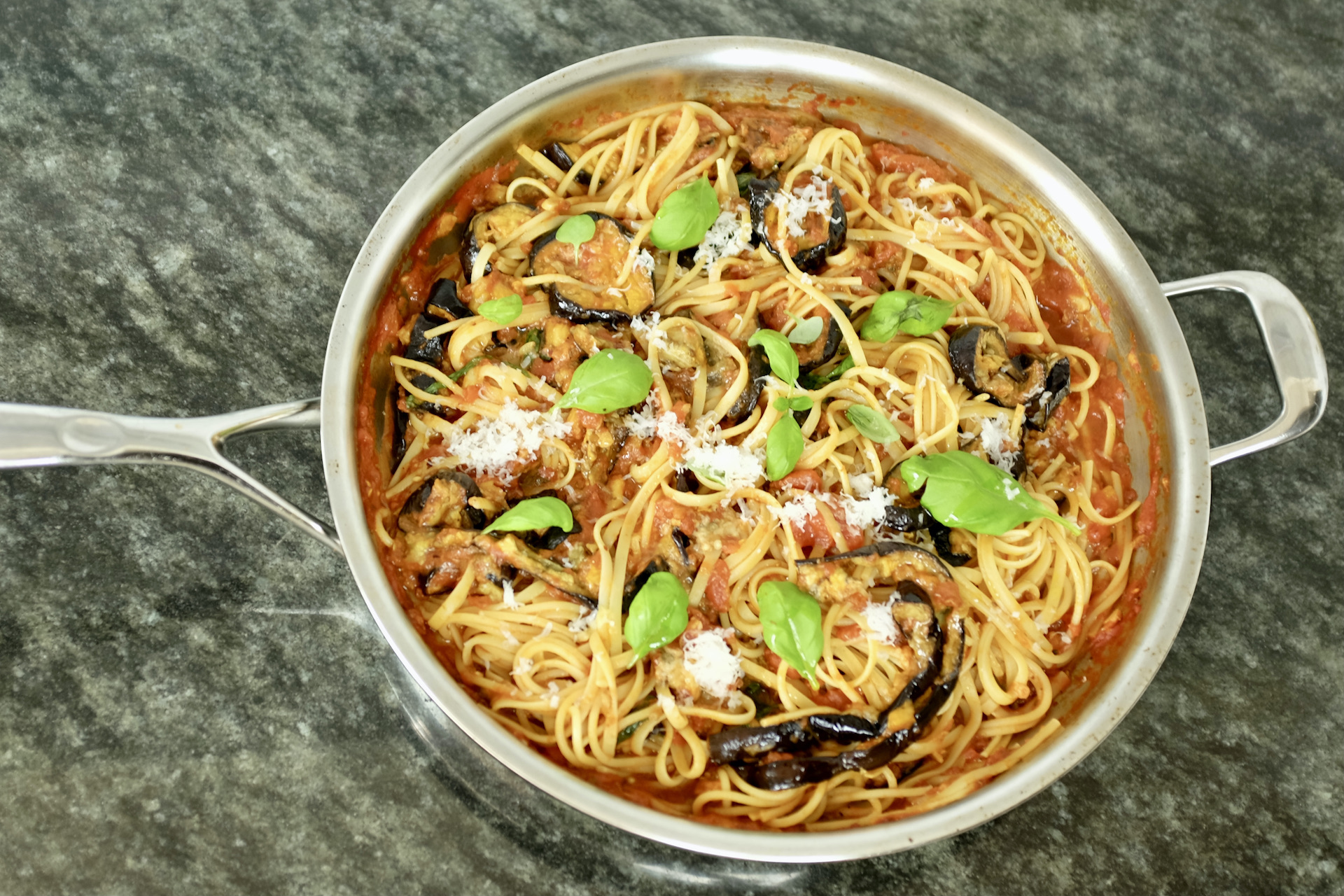 linguine alla norma with aubergines tomatoes garlic oregano and pecorino romano cheese