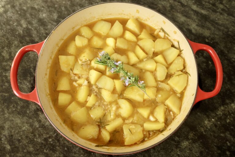 spanish style boiled potatoes with paprika fresh rosemary onion and garlic